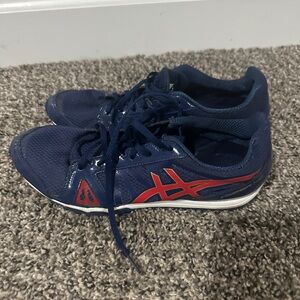 Used and well worn women’s Asics track spikes flats, size 7.5